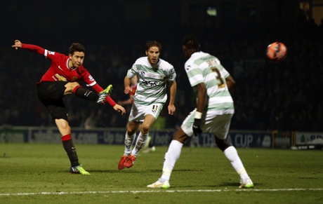Manchester United s Ander Herrera, left, shoots and scores the opener.