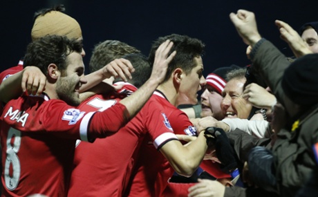 Ander Herrera, celebrates with the crowd, the referee issued a yellow card.