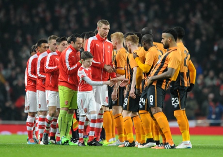 Arsenal players exchange hand shakes with Hull City.