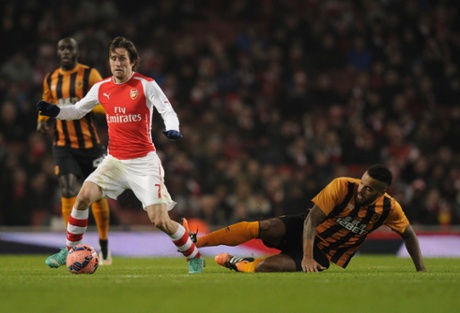Tomas Rosicky escapes Tom Huddlestone.