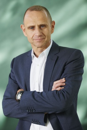 Rocking the open-collar business-casual look.