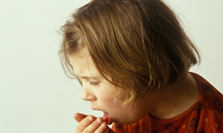 young child coughing