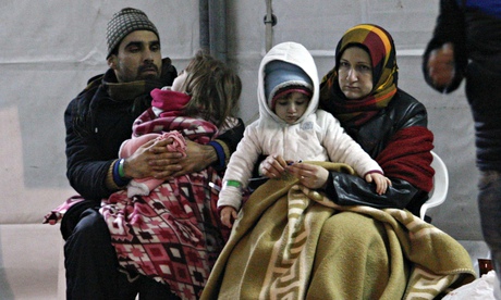 Some of the hundreds of Syrian people rescued by the Italian navy after being abandoned on the Ezade