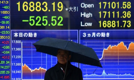 Share prices board in Tokyo, where the Nikkei dropped 455.48 points to close at 16,953.23 points at the Tokyo Stock Exchange, tracking a slump on Wall Street and European markets as renewed Greek political woes fan fears over the eurozone.