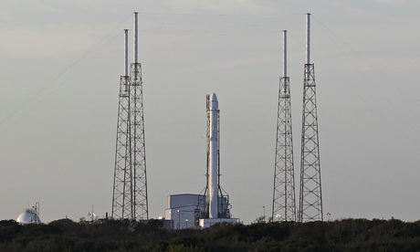 The Falcon 9 rocket sits on the launch pad after an aborted liftoff from Cape Canaveral.