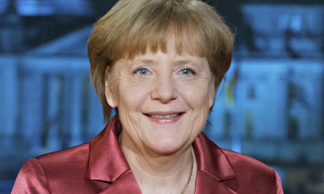 Angela Merkel smiles after recording her new year's speech in the Chancellery in Berlin