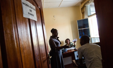 Chantal Rugenera Kambibi, head of mission for the Program of Stabilization and Reconstruction of Armed Conflict Zones (STAREC) in North Kivu, works from her office in Goma, D.R. Congo, July 25, 2014.   We who take courage, who talk, we re seen like women who lost their heads, who are abnormal,  says Kambibi.
