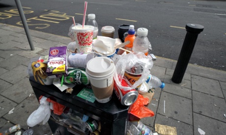 Overflowing litter bin in Brighton city centre.l