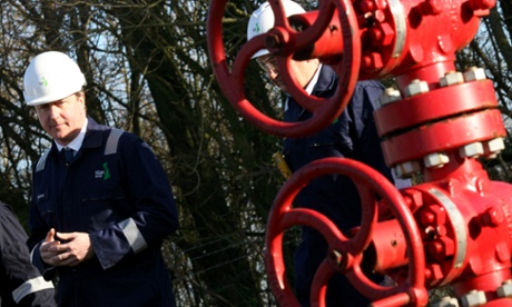 Prime Minister David Cameron visits the Total Oil Depot shale drilling site in Gainsborough, Lincolnshire on January 13, 2014. Prime Minister David Cameron indicated councils would receive a significant financial boost from the business rates collected from controversial shale gas schemes, with local authorities receiving 100% of the business rates, double the usual 50%.