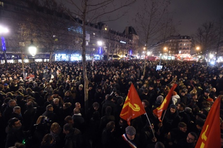 People gather at the Place de la Republique in Paris this evening