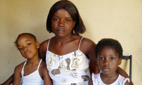 Gabriella Pierre and her two daughters. The 35-year-old teacher left Port-au-Prince after the earthquake and now lives in Village Solidarite, near Lascohabas on Haiti's central Plateau.