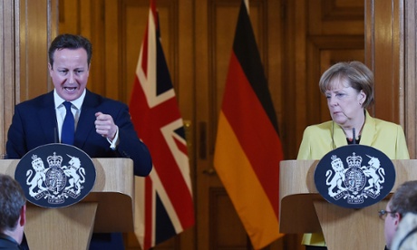 British Prime Minister David Cameron with German Chancellor Angela Merkel during a press conference in Downing Street in London