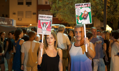 A crowd gathers in Rio De Janeiro in a vigil for the Charlie Hebdo attack.