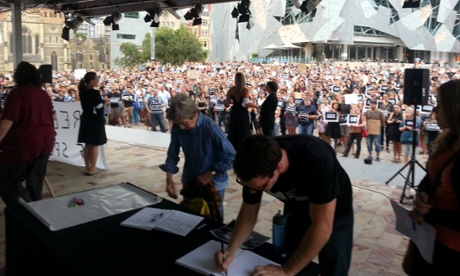 About 1000 people gathered in Melbourne at a vigil for the victims of the Charlie Hebdo attack.