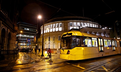 A Metrolink tram in St Peter's Square in Manchester