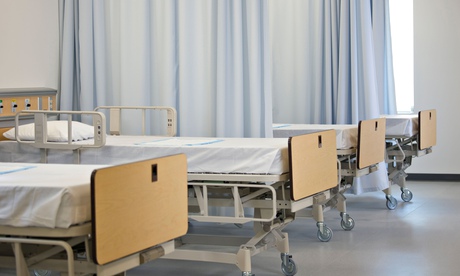Empty hospital beds 