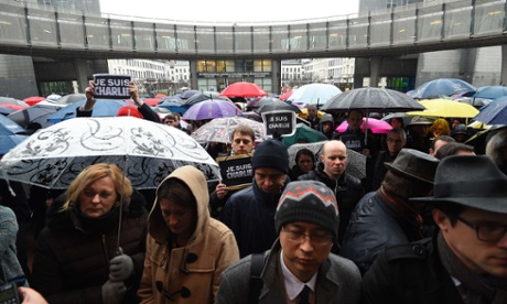 People gather for minute of silence at the European parliament in Brussels.