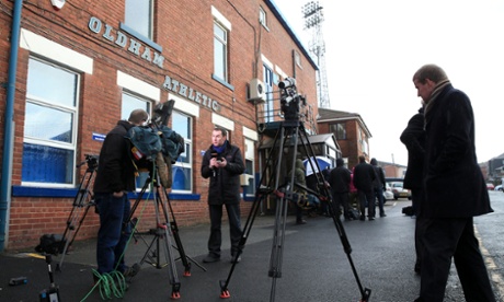 A view of the media gathered outside Boundary Park, Oldham.