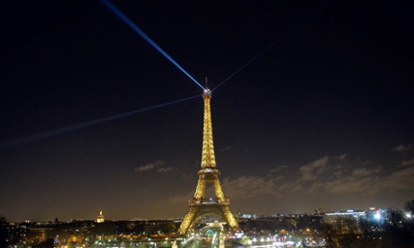 As a tribute for the victims of yesterday's terrorist attack the lights of the Eiffel Tower were turned off for five minutes at 8pm local time on January 8, 2015 in Paris, France.
