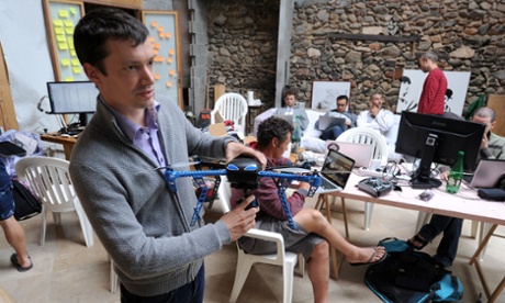 Project engineer Antoine Level shows a drone prototype named Hexo+ on July 2, 2014 in Saint-Martin d'H res, centraleastern France. The Grenoble-based start-up Squadrone System launched a Kickstarter campaign for the HEXO+, a camera that needs no camera man and can fly and follow whatever target it is given.
