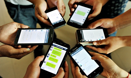 People holidng smartphones