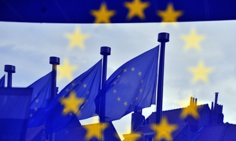 European flags are reflected at the entrance of the Berlaymont building EU Commission in Brussels