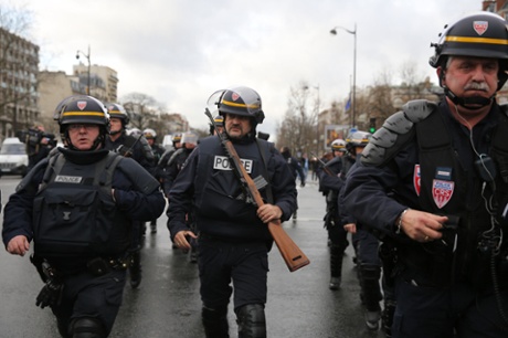 Police head towards Porte de Vincennes in Paris