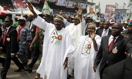 President Goodluck Jonathan waves to his supporters during a campaign rally