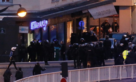 Members of the BRI police elite unit launch an assault on the HyperCasher supermarket