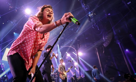 One Direction perform on stage