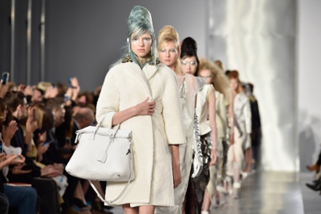 Models on the Maison Margiela catwalk.