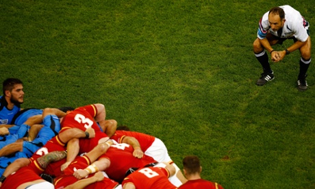Referee Romain Poite keeps an eye on the scrum during Wales v Uruguay.