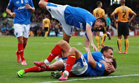Bundle: Matt Tubbs marks another hat-trick. Photograph: John Marsh/Reuters