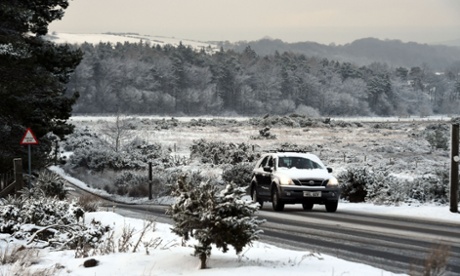 car driving through snow