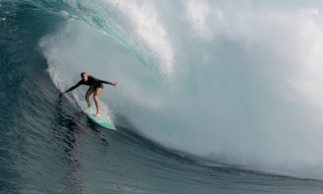 The ride of a lifetime … Paige Alms gets barrelled at the Jaws surf break in Maui, Hawaii