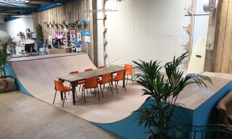 Meeting table in middle of skateboard ramp