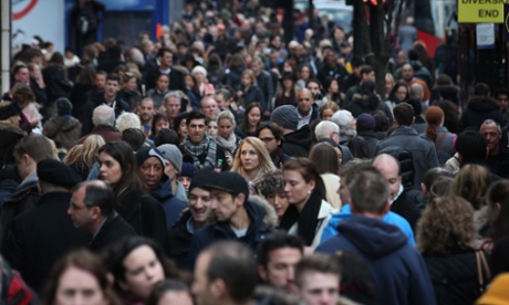 Shoppers crowd the pavement in Oxford Street 