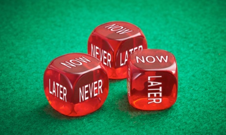 Three red die with faces reading now, never and later