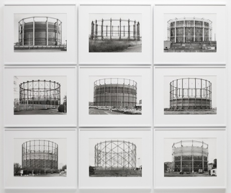 9 black-and-white photographs of gas holders