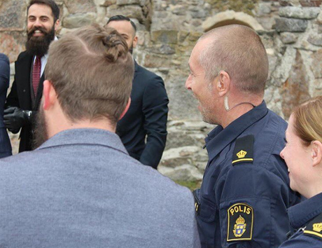 Swedish police officers show up at an @beardedvillains_sweden photoshoot.