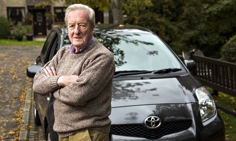 Derek Harlow with his car.