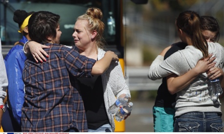 Students arriving from campus are greeted by friends and family as they arrive at the fairgrounds in Roseburg Shooting at Umpqua College.