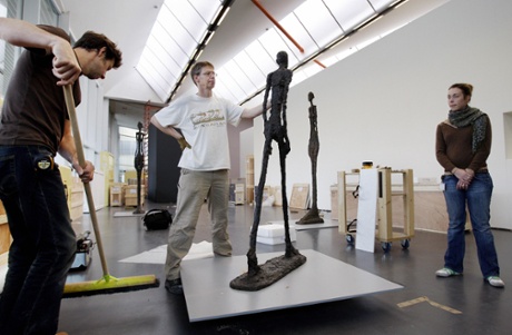 Adjustments are made to Giacometti’s Walking Man at Rotterdam’s Kunsthal.