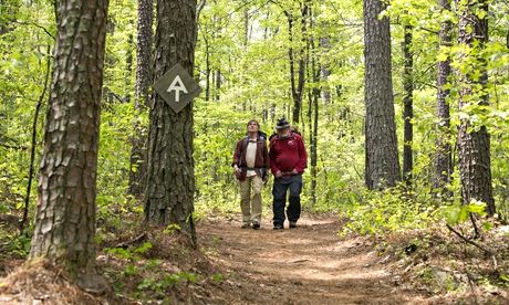 Robert Redford as Bill Bryson and Nick Nolte as Stephen Katz hiking the Appalachian Trail in 