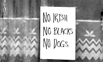 Sign in London reading No irish No Blacks No Dogs