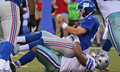 Dallas Cowboys defensive end Greg Hardy sacks New York Giants quarterback Eli Manning.