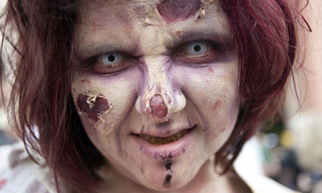 Zombies walk through the Gaslamp district during the 2012 Comic-Con in San Diego, California. 