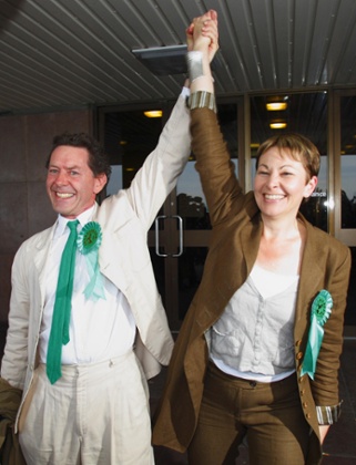 Caroline Lucas celebrates with her husband Richard Savage
