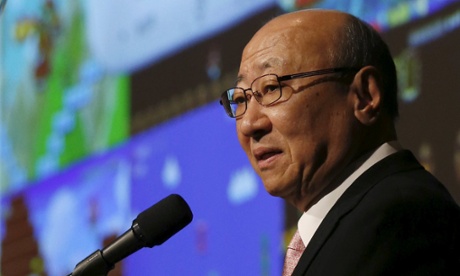 Nintendo boss Tatsumi Kimishima speaking at the company's announcement of its first smartphone game.