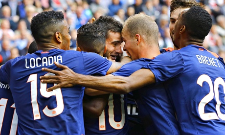 PSV Eindhoven's Gaston Pereiro celebrates with his teammates after scoring the winning against Ajax.